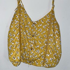 Yellow cropped tank top with tied straps